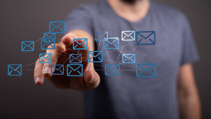 Digital illustration of a person interacting with a network of email icons, representing...