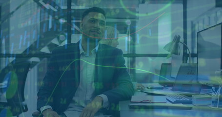 Image of data processing over diverse business people using computers in office