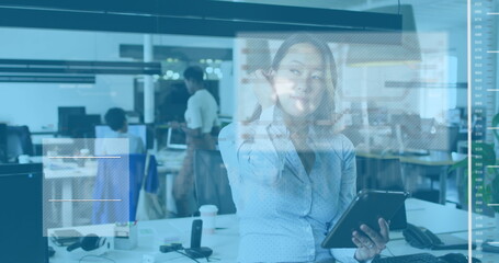 Image of data processing over asian businesswoman using tablet in office