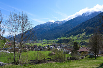 Neustift im Stubaital, Austria - April 19, 2025 - a small town in an alpine valley at Easter time
