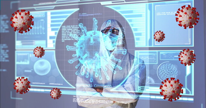 Image of covid 19 cells and data processing over caucasian male doctor in ppe suit