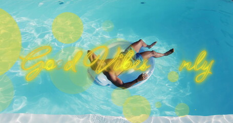 Image of good vibes only african american man in swimming pool