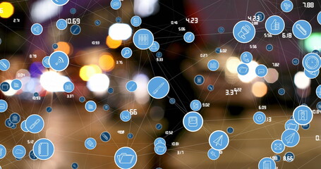 Image of connected media and social network icons and processing data over city street at night