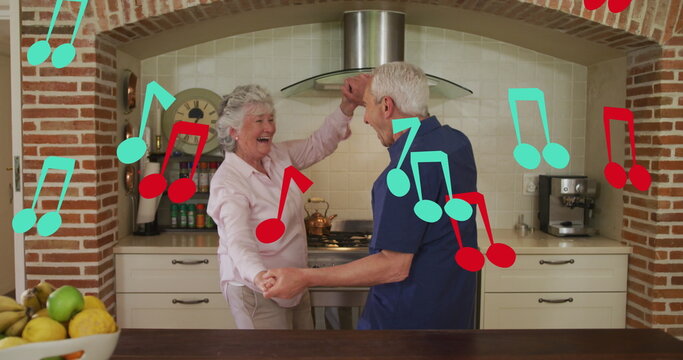 Image of falling notes over caucasian senior couple dancing - Powered by Adobe