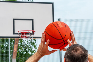 basketball player holding ball