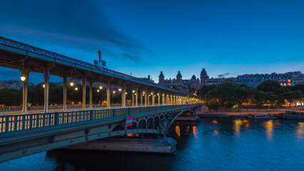 View of pont de Bir-Hakeim day to night timelapse - a bridge that crosses the Seine River. Paris, France