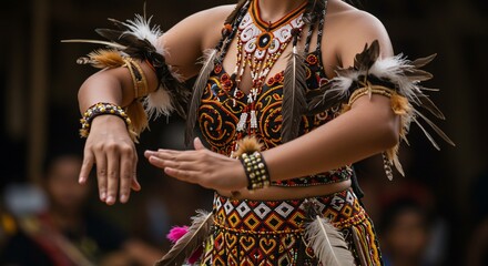 Indigenous dancer adorned in vibrant attire