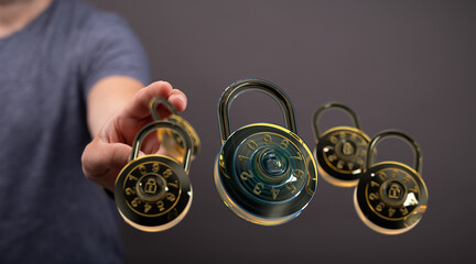 Image of a man holding multiple digital combination locks, symbolizing data security and online...