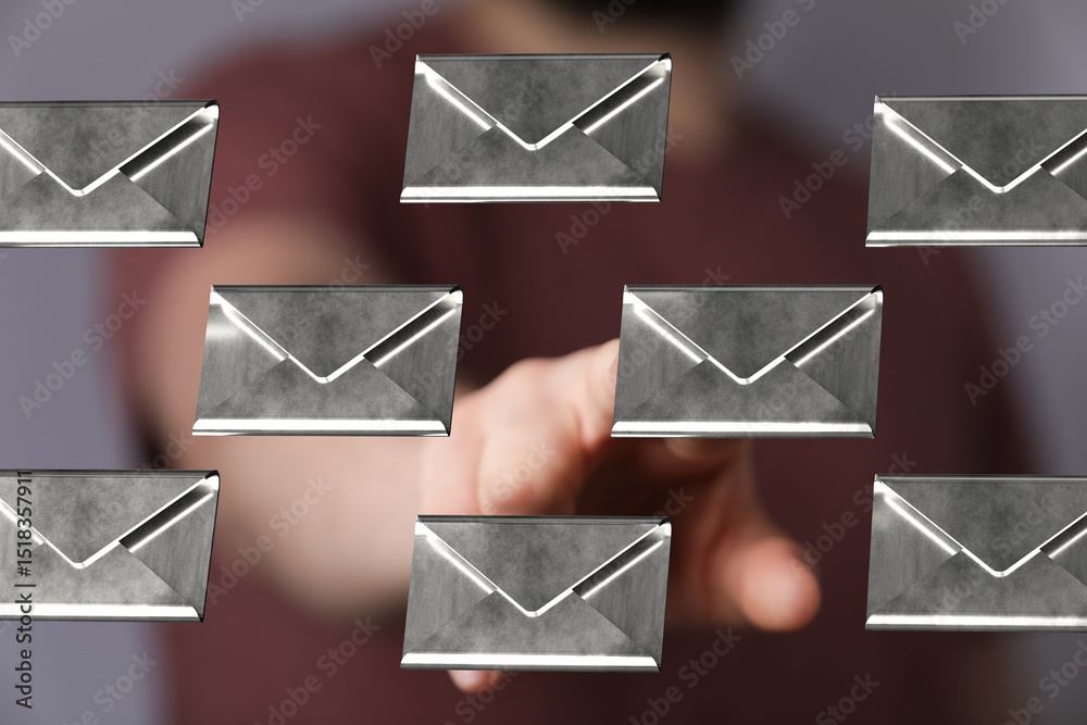 Poster abstract image of a hand interacting with digital email envelopes.