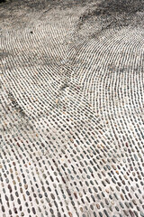 A decorative pebble pattern on the floor