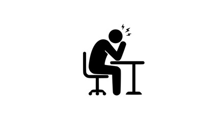 A man is sitting at a desk with his head in his hands