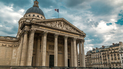 Obraz premium National pantheon building timelapse, front view with street and people. Paris, France