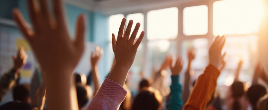 The lively classroom with eager hands raised for participation
