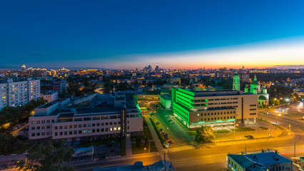 Aerial panorama of Moscow day to night timelapse from rooftop. Skyscrapers, Kremlin towers