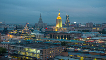 Fototapeta premium Evening top view of three railway stations day to night timelapse at the Komsomolskaya square in Moscow, Russia