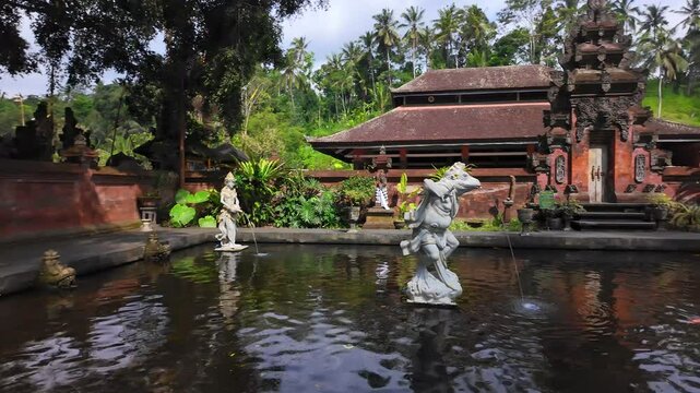 Picturesque view of pool water iancient Pura Tirta Empul Temple on Bali, Indonesia