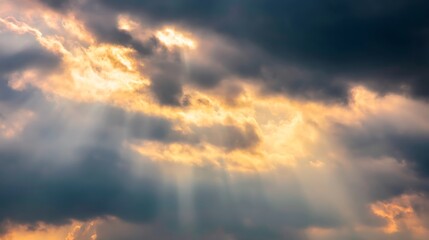 Fototapeta premium Dramatic sky with sun rays breaking through