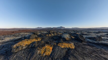 Obraz premium Hardened lava flow with distant mountains