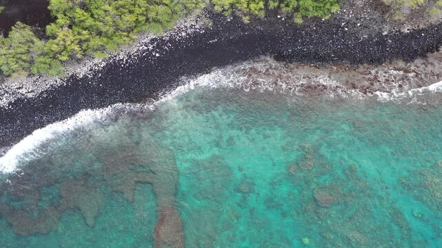 Blue green ocean and lava rocks in Maui Hawaii