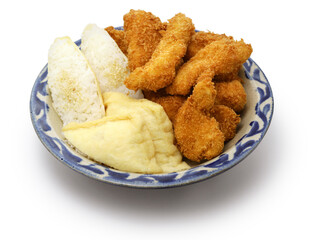 Inarizushi (vinegared rice wrapped in deep-fried bean curd) and garlic chicken, Okinawa food in Japan.