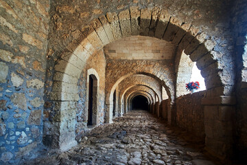 a stone arcades of a historic monastery Orthodox Moni Arcadia on the island of Crete