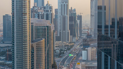 Dubai Downtown evening timelapse modern towers view from the top in Dubai, United Arab Emirates.