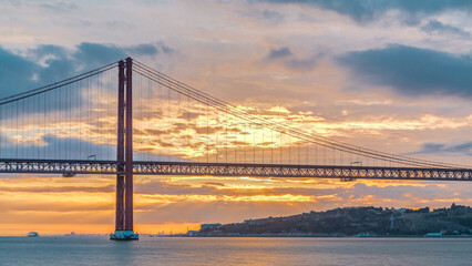 Lisbon city sunrise with April 25 bridge timelapse