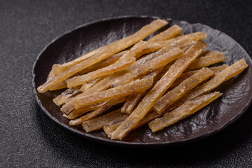 Food, snacks or jerky made from dried dehydrated salted fish with spices. Snacks fish