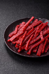 Jerky or dried chicken and cherry snacks. Dehydrated, dried snacks for beer