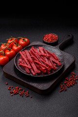 Jerky or dried chicken and cherry snacks. Dehydrated, dried snacks for beer