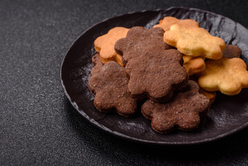 Sweet crispy biscuit with cocoa flavor, baking at home. Biscuit as a dessert