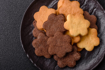 Sweet crispy biscuit with cocoa flavor, baking at home. Biscuit as a dessert