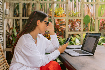 Business woman work on laptop computer in cafe