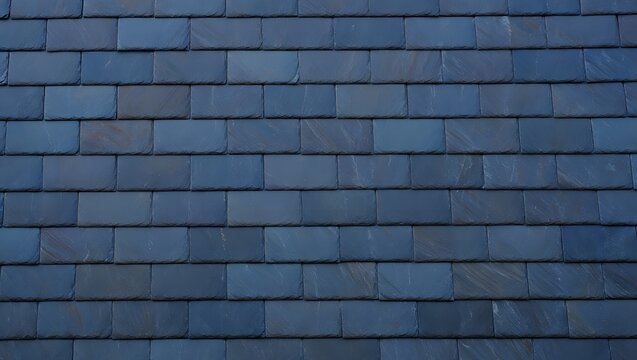 Dark blue slate roof tiles arranged in a regular pattern, creating a textured surface