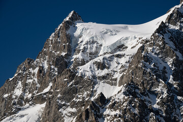 Glacier capped Mont Pelvoux in the Ecrins Mountains in the French Alps
