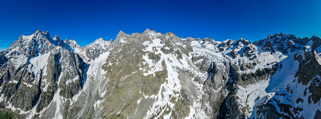 Aerial view of The Glacier Blanc in the Ecrins Mountains France Melting during Springtime - Most Beautiful French Alps Mountains © Mike Workman