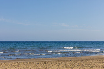 Faro de Maspalomas Spain seascape, beach and lighthouse Faro and sand dunes in Gran Canaria