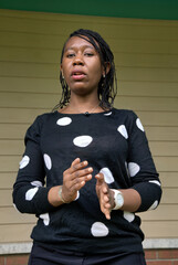 Confident African Woman Arguing and Gesturing While Talking