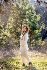 Anticipating the Arrival of New Life A Serene and Beautiful Maternity Portrait in Nature
