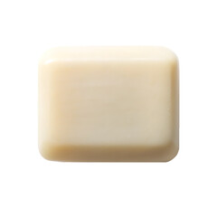 Creamy rectangular soap bar isolated against a dark black background for design and concepts
