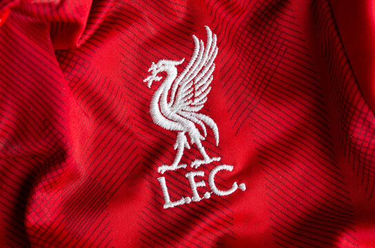 Kyiv, Ukraine, June 3, 2025. Close-up of the Liverpool Football Club emblem embroidered on red fabric with textured pattern.