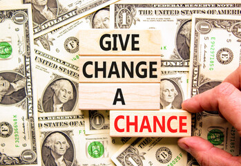Give change a chance symbol. Concept words phrase Give change a chance on beautiful wooden blocks....
