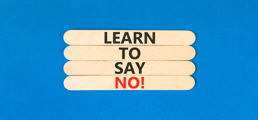 Learn to say no symbol. Concept words phrase Learn to say no on beautiful wooden stick. Beautiful...