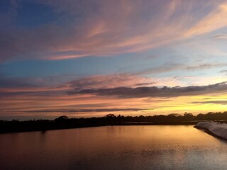 Obraz premium sunset over the river
