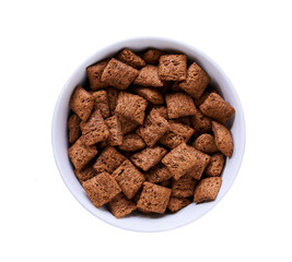 chocolate pillows in a plate isolated on a white background, top view. healthy sweet snack for breakfast.