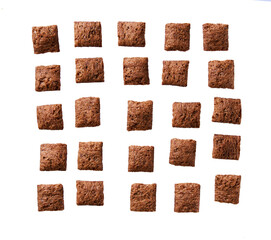 chocolate pillows isolated on white background top view.