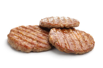 Three delicious hamburger patties isolated on white