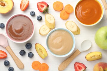 Baby food. Tasty puree in bowls and different ingredients on white wooden table, flat lay