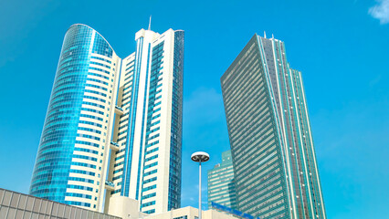 Fototapeta premium Nurzhol Boulevard timelapse hyperlapse. Modern new office building is in the capital of Republic. Astana, Kazakhstan.