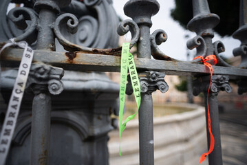 View of souvenir ribbons tied to a railing in Pelourinho, the historic center of the city of Salvador, Brazil.